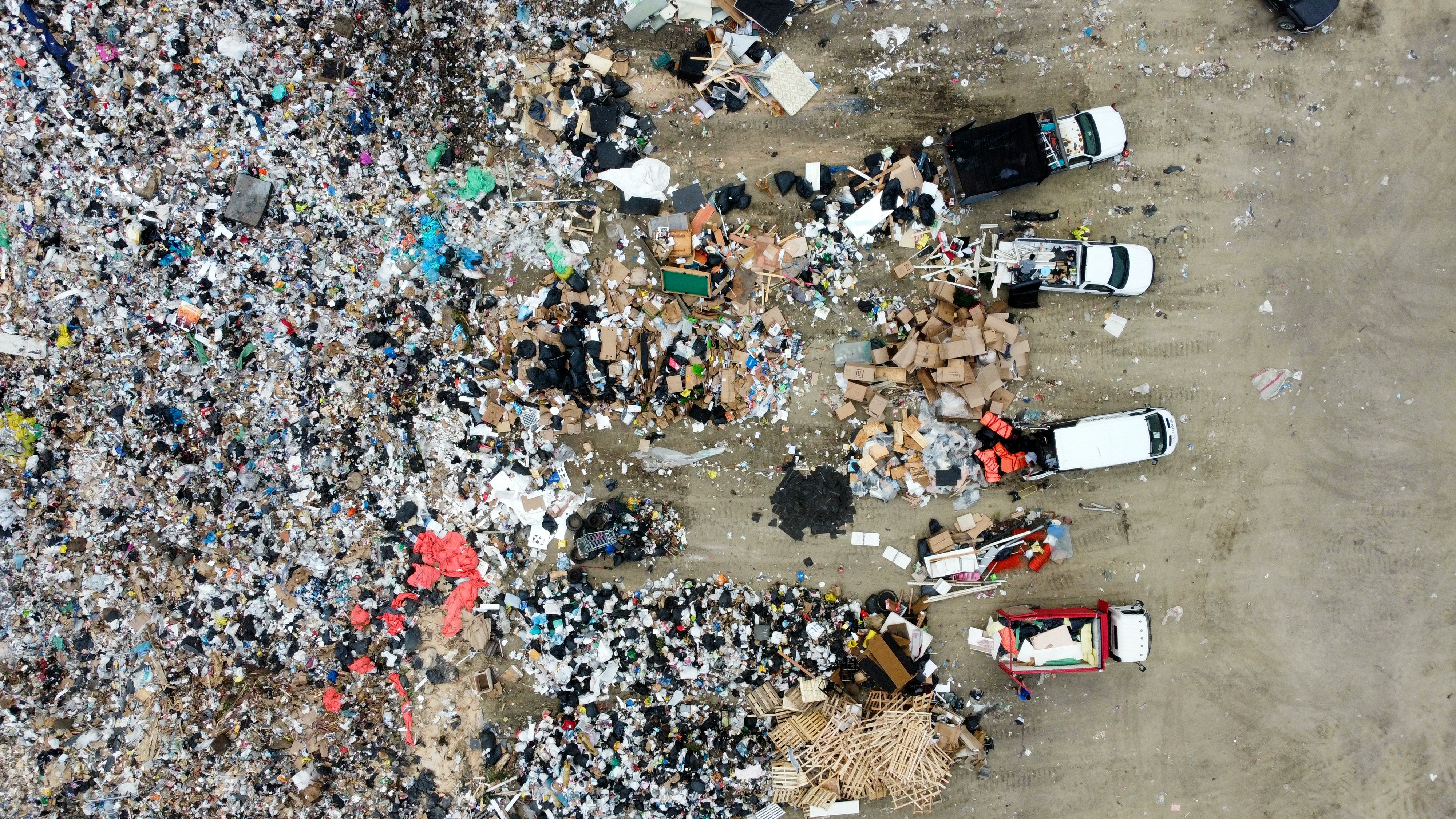From Drone Maps to Dumping Alerts: A YOLOv7 Pipeline for Environmental Monitoring
